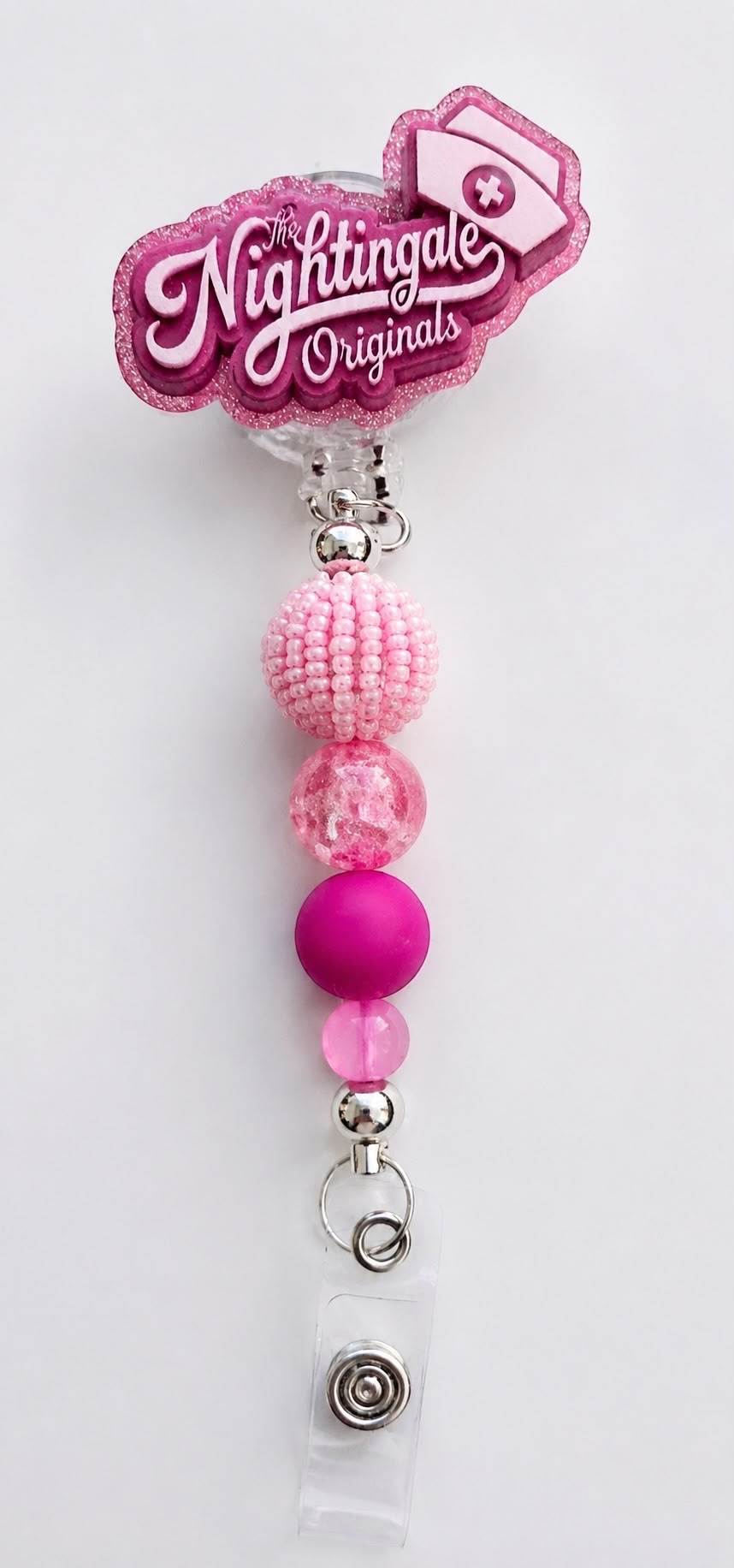 The Nightingale Original™ Signature Badge Reel