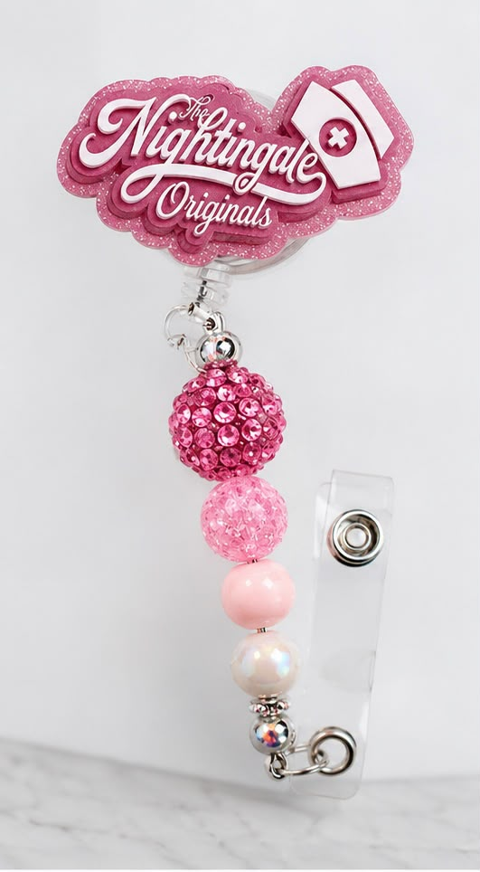 The Nightingale Original™ Signature Badge Reel
