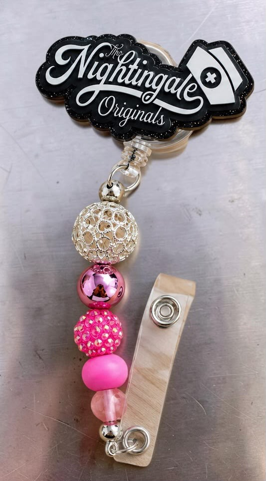 The Nightingale Original™ Signature Badge Reel