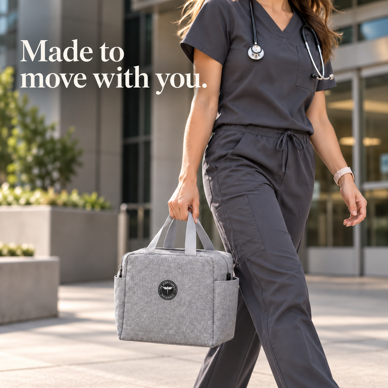 Person wearing gray scrubs carrying a gray Famish’d lunch bag beside a Made to move with you caption.