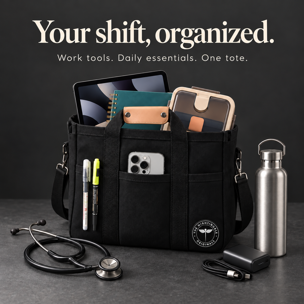 Black Satch’l clinical tote packed with work essentials, displayed beside a stethoscope and water bottle.